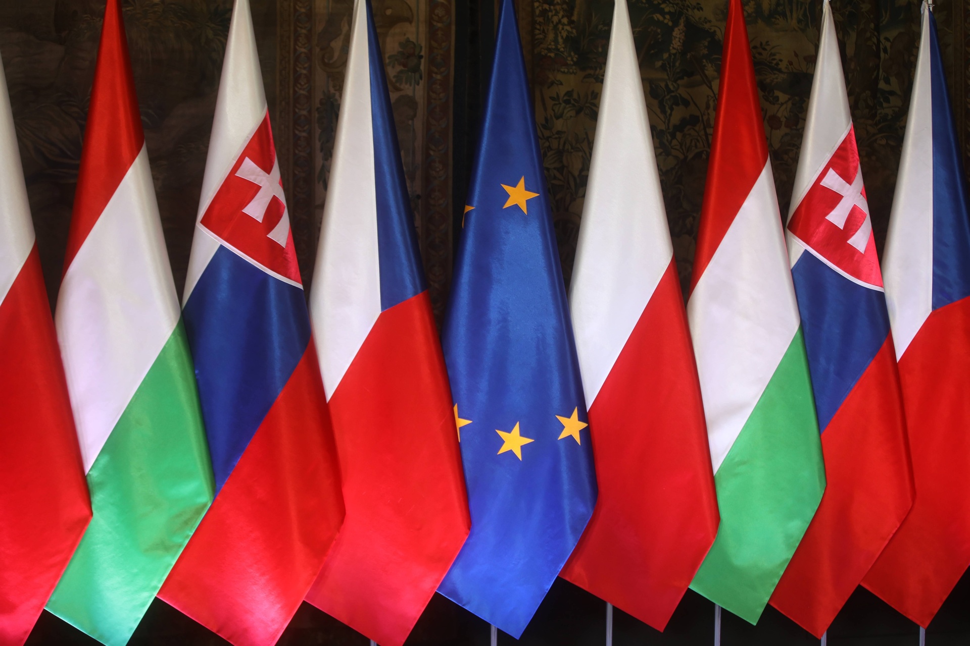 Flags of the Visegrad Group countries - Poland, Czech Republic, Slovakia and Hungary - and the European Union.